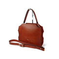 Handmade custom leather satchel with adjustable shoulder strap, bespoke craftsmanship and personalization