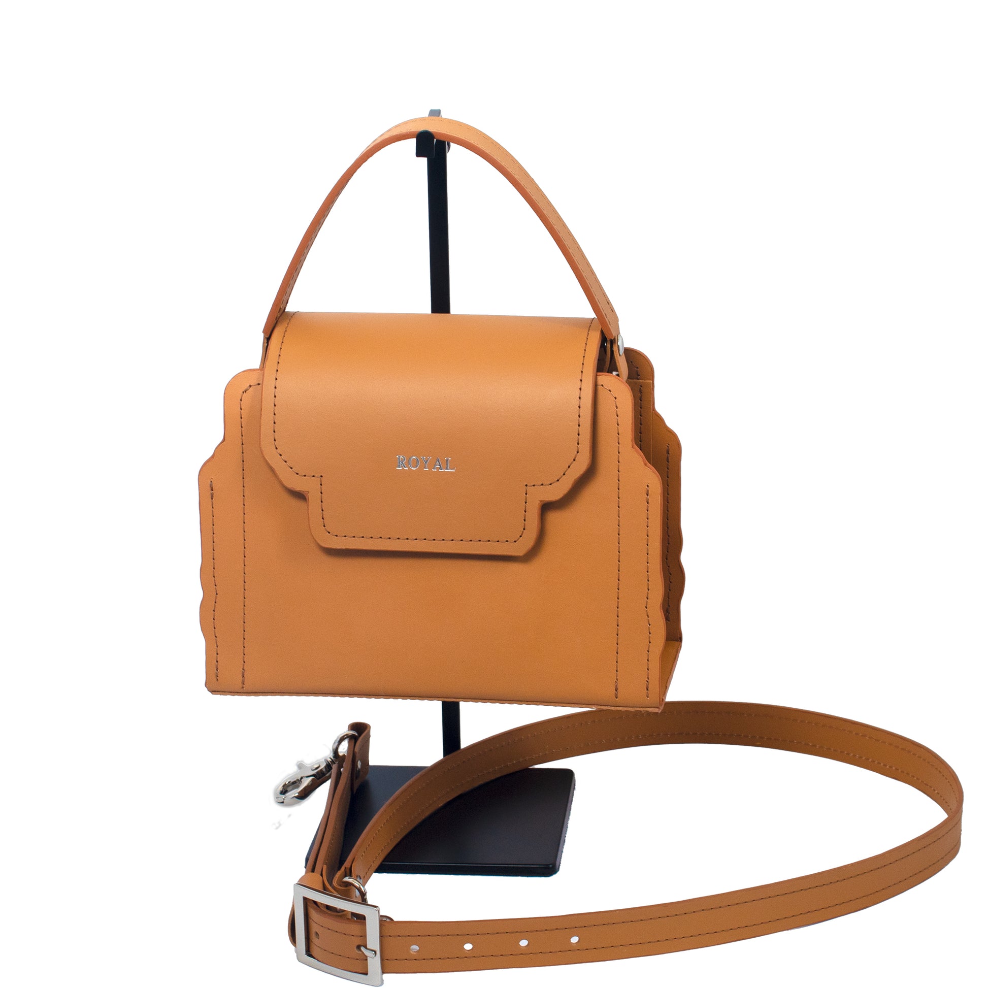 Hope hand‑painted full‑grain leather crossbody in tan with a removable strap in a refined, custom luxury small satchel silhouette.  