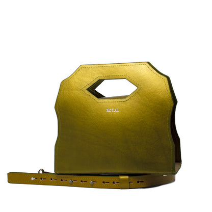 Handcrafted Meek leather satchel in olive green metallic with a removable strap in a refined, custom‑made design.  